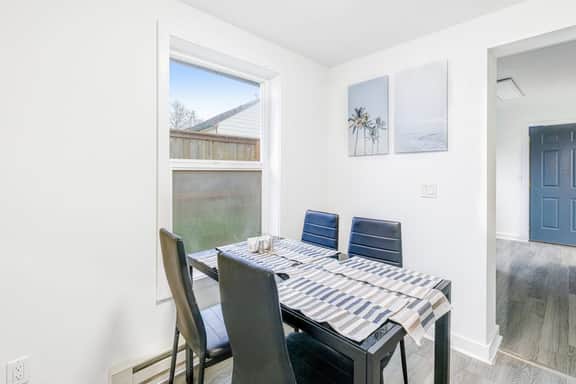 Ocean view home with pool table and fast WiFi steps to beach shops and eateries