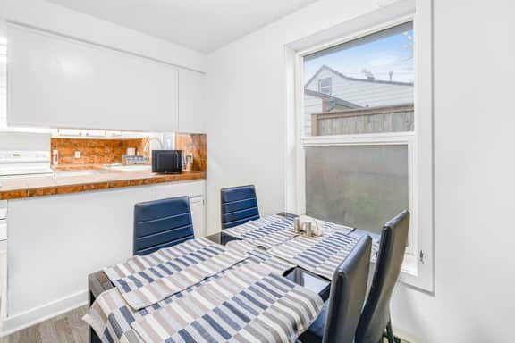 Ocean view home with pool table and fast WiFi steps to beach shops and eateries