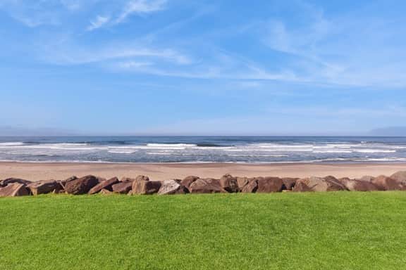 Beautiful ocean front condo with stunning views WiFi steps to beach