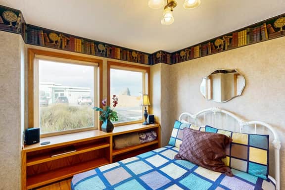 Gorgeous waterfront home with ocean views a furnished deck and beach access