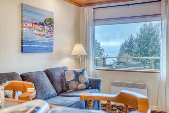 Welcoming Condo with Ocean Views and Private Hot Tub Short Walk to the Beach