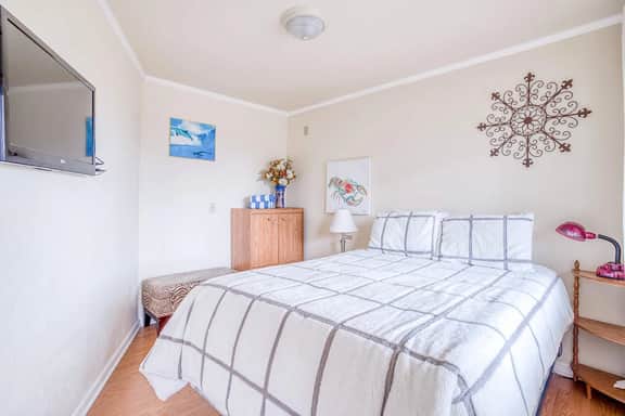 Welcoming Condo with Ocean Views and Private Hot Tub Short Walk to the Beach