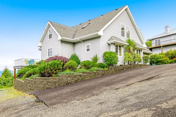 Spacious family home near the beach with ocean view large deck free WiFi and more