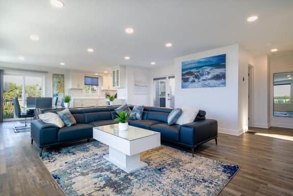 Renovated lake ocean view retreat with hot tub outdoor living and fireplace
