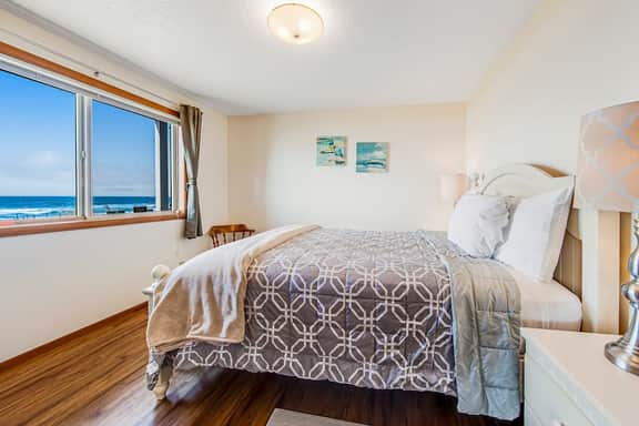 Two story oceanfront retreat with a washer dryer firepit and Ping Pong table