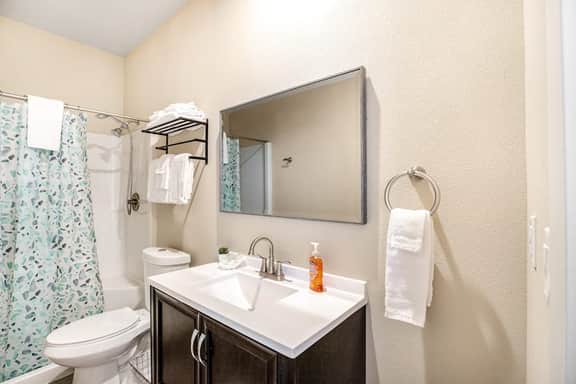 Coastal getaway with deck beach gear and washer dryer walk to beach