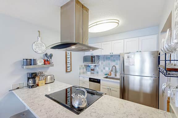Rock Creek Inn condo on beach with ocean view balcony walk to shops and dining