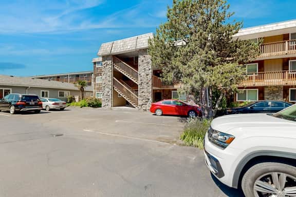 Creekfront Condo with Private Patio Beach Access Shared with D Gas Grill and Views