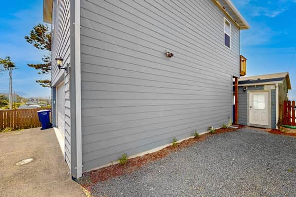 Ocean front home with spacious deck and beach access near shops and restaurants