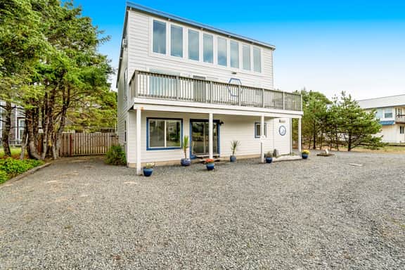 Dog friendly home across street from beach with rooftop deck and views