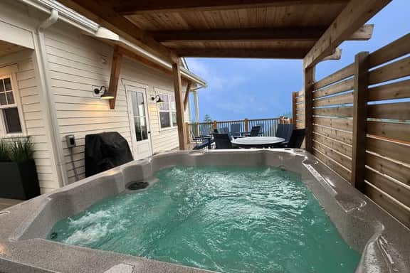 Family friendly home with ocean views private hot tub foosball table and gas grill