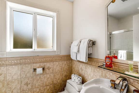 Waterfront dog friendly home a few steps from the beach with hot tub