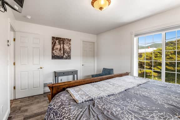 Waterfront dog friendly home a few steps from the beach with hot tub