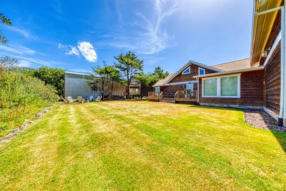 Lakefront home with furnished deck firepit and amazing views walk to the beach