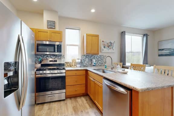 Lakefront townhome with electric grill firepit ping pong table and shared dock
