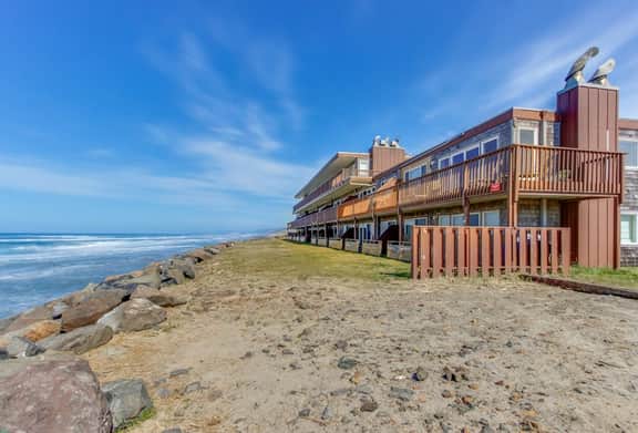 Dog friendly oceanfront condo with amazing ocean views steps to beach