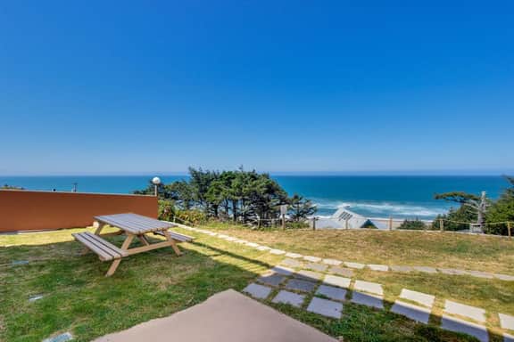 Romance awaits with ocean views and sandy shores at this dog friendly studio