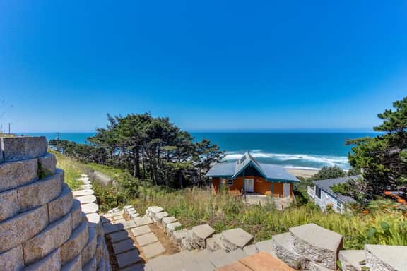 Romance awaits with ocean views and sandy shores at this dog friendly studio