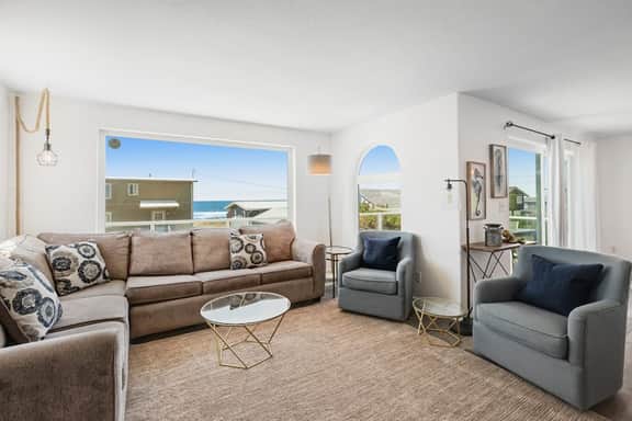 Dog friendly ocean view home with deck and enclosed yard 1 block to beach