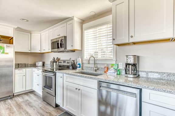 Ocean view home 1 block from the beach with hot tub deck and fireplace