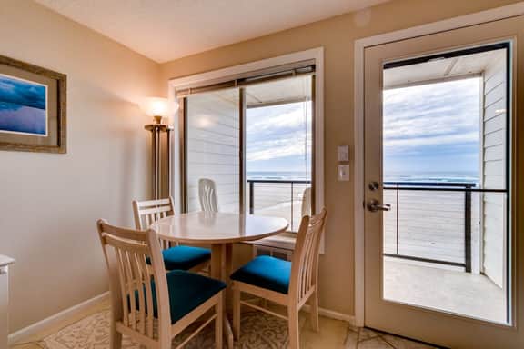 Oceanfront condo with a full kitchen balcony and sweeping sea views