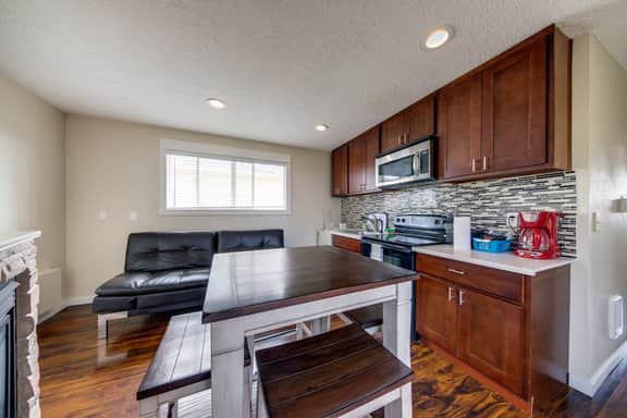 Upper Level Condo with Private Balcony and Nearby Beach Access Dog Friendly