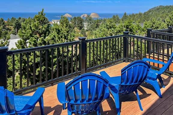 Sweeping ocean view home with fireplace grill and foosball table dog friendly