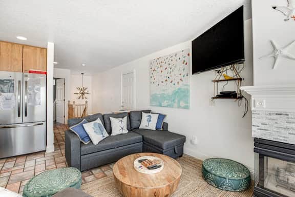 Charming dog friendly waterfront beach home with lovely patio