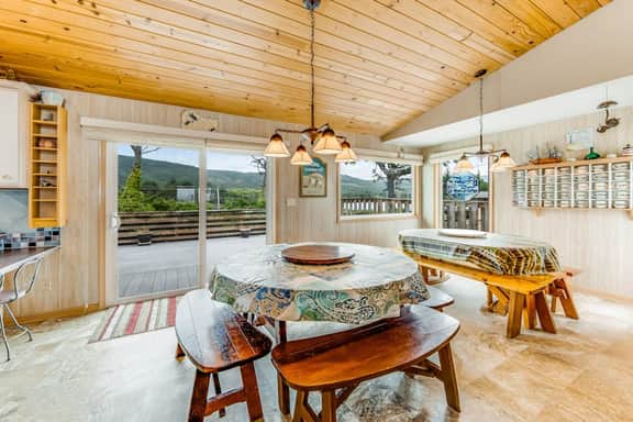 Spacious family home with ocean view balcony deck and fireplace dogs OK