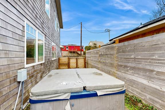 Dog friendly beach home with firepit private hot tub beach access and arcade