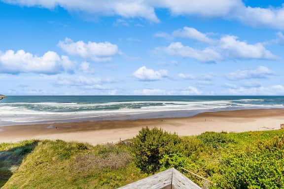 Bella Beach home with ocean view gas fireplace beach access and private hot tub