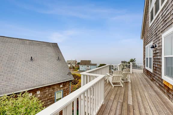 Ocean view home with hot tub game room furnished deck and fireplaces