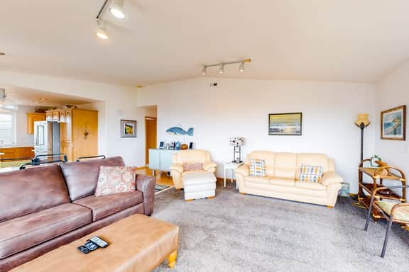 Comfy beach home with ocean views free WiFi private washer dryer and deck