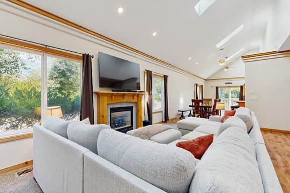 Expansive family friendly home with a private hot tub walk to the beach