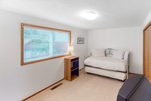 Cozy dog friendly getaway one block from beach with fireplace and gas grill