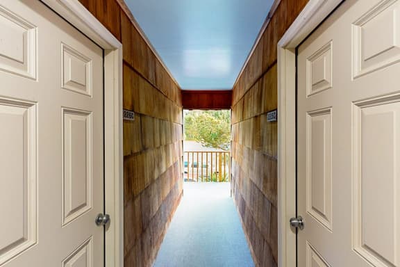 Creekside condo with beach access balcony full kitchen and ocean views