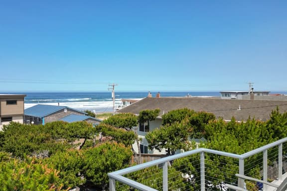 Renovated lake ocean view retreat with hot tub outdoor living and fireplace