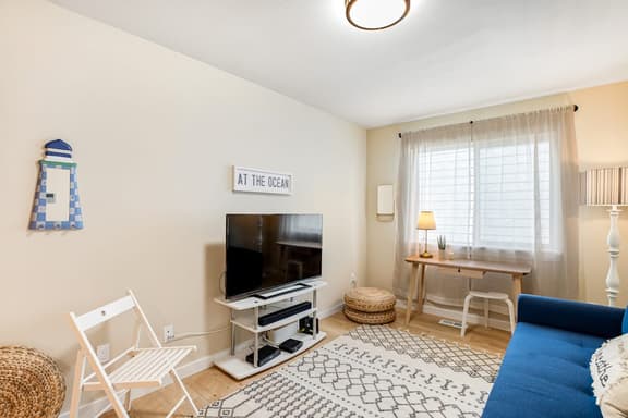 Coastal getaway with deck beach gear and washer dryer walk to beach
