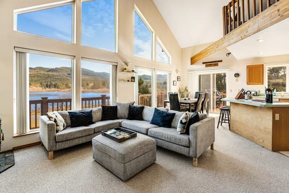 Lake view getaway steps from beach with WiFi and private washer dryer