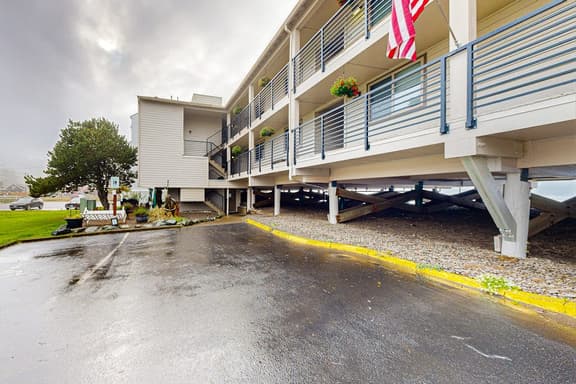 Rock Creek Inn condo on beach with ocean view balcony walk to shops and dining
