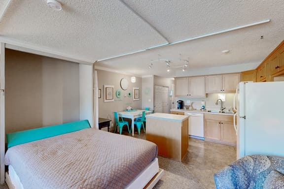 Creekfront Condo with Private Patio Beach Access Shared with D Gas Grill and Views