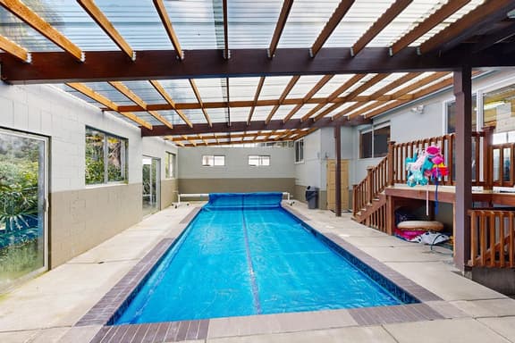 Centrally located home with lake views private pool and spacious deck