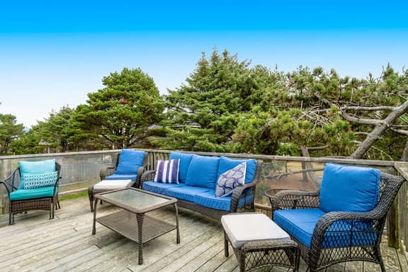 Dog friendly home across street from beach with rooftop deck and views