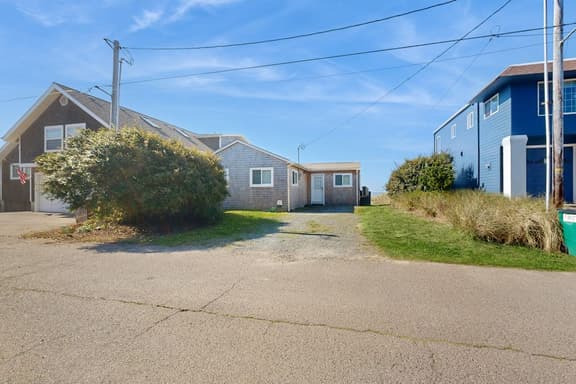 Quaint Beach Getaway with Beach Access Ocean View and Perfect Location Near Town