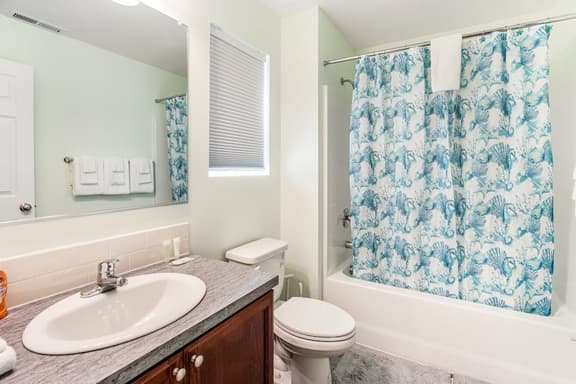 Wonderful duplex with central AC 2 washer dryers 1 minute walk to beach