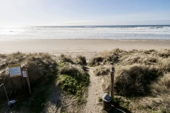 Coastal Paradise Awaits Spacious Retreat with Firepit and Entertainment