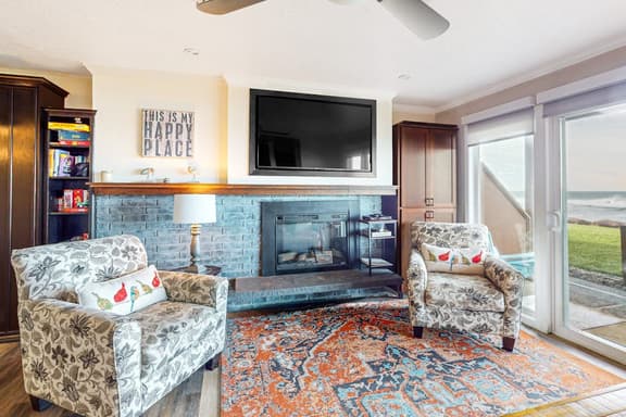 Oceanfront ground level condo with fireplace and updated kitchen dog friendly