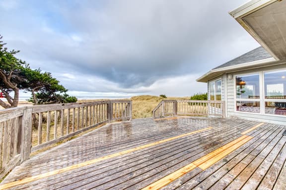 Dog friendly oceanfront house with wood burning fireplace deck and beach access
